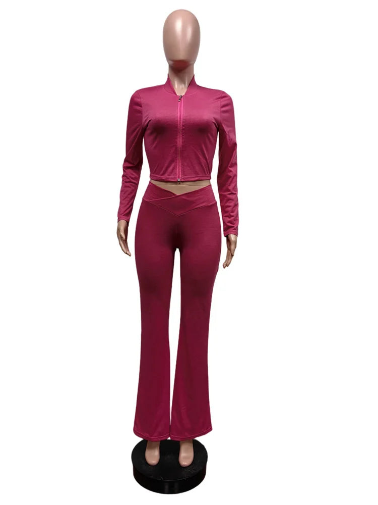 Chic Women's Black O-Neck Crop Top & Flared Pants Set.